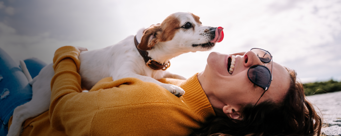 lady relaxing with dog