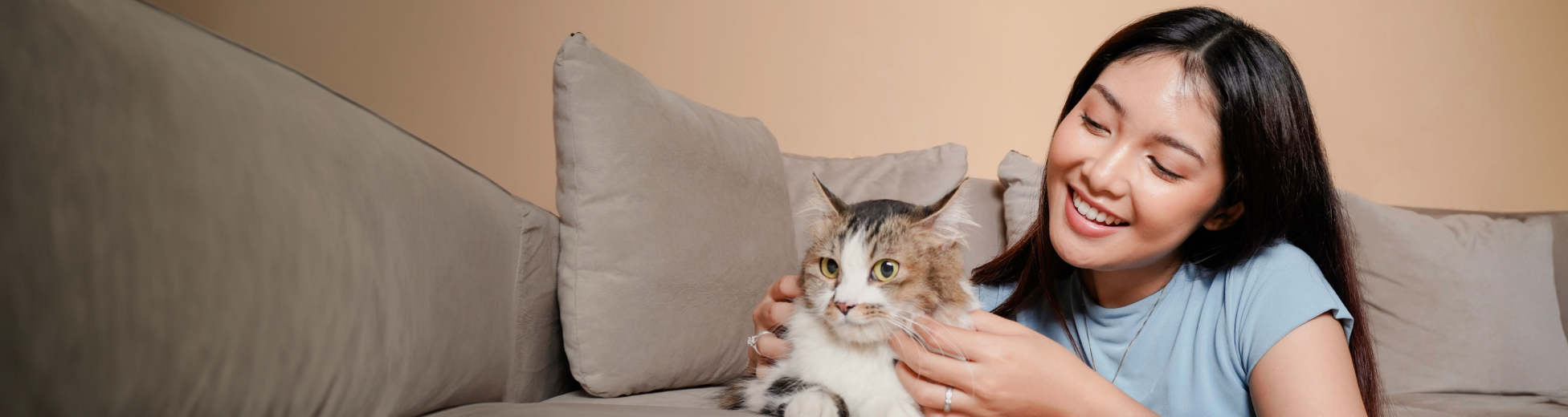 Lady with cat on couch